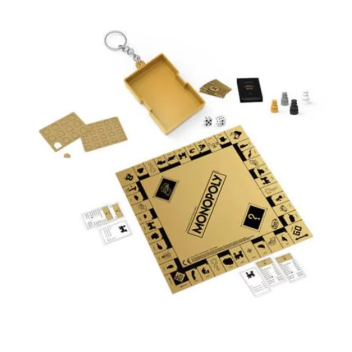Hasbro Mini Monopoly Gold inhoud